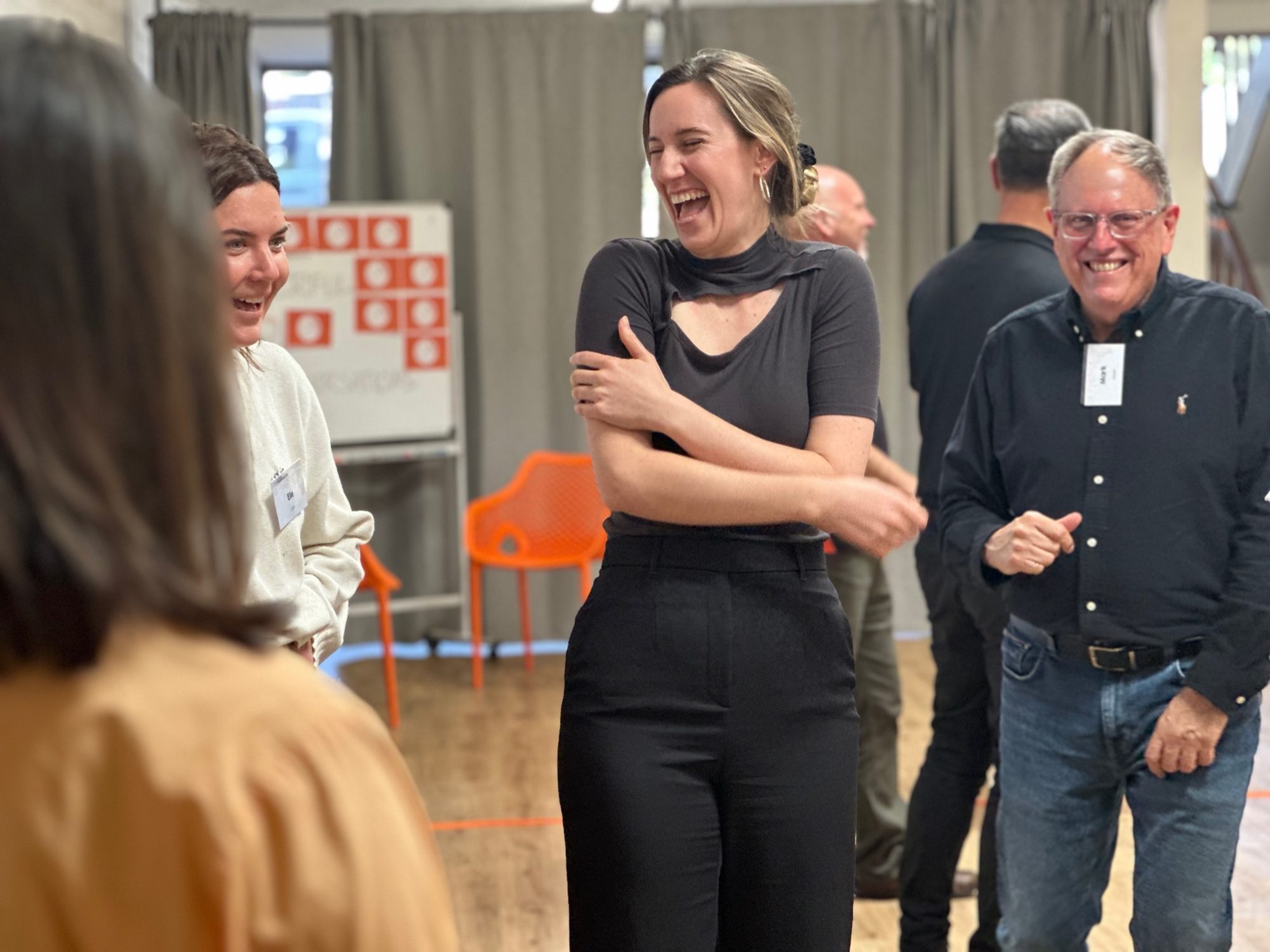 Ashana laughing during a community open event